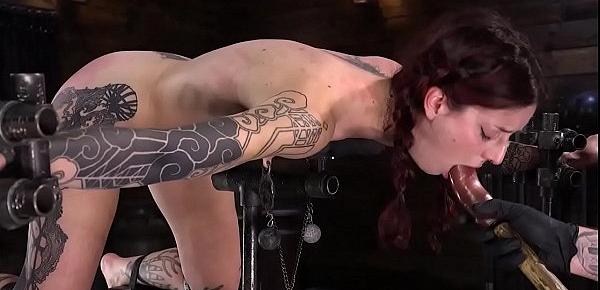 Tattooed slut toyed on device bondage